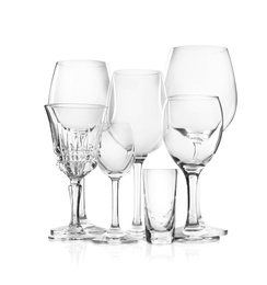 Set of new bar glassware on white background