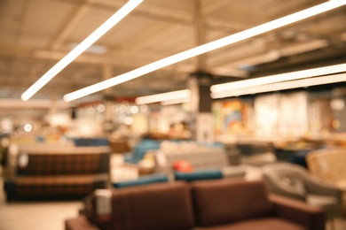 Blurred view of modern shopping mall interior