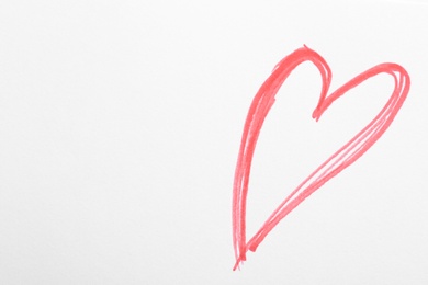 Photo of Red heart drawn on white paper, top view