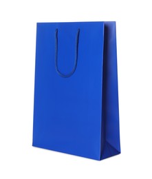 Photo of One blue shopping bag isolated on white