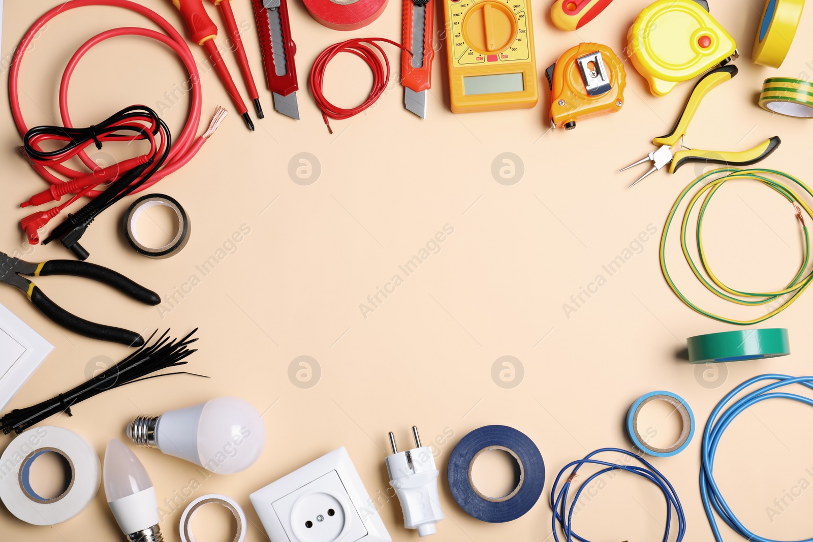 Photo of Flat lay composition with electrician's tools and space for text on color background