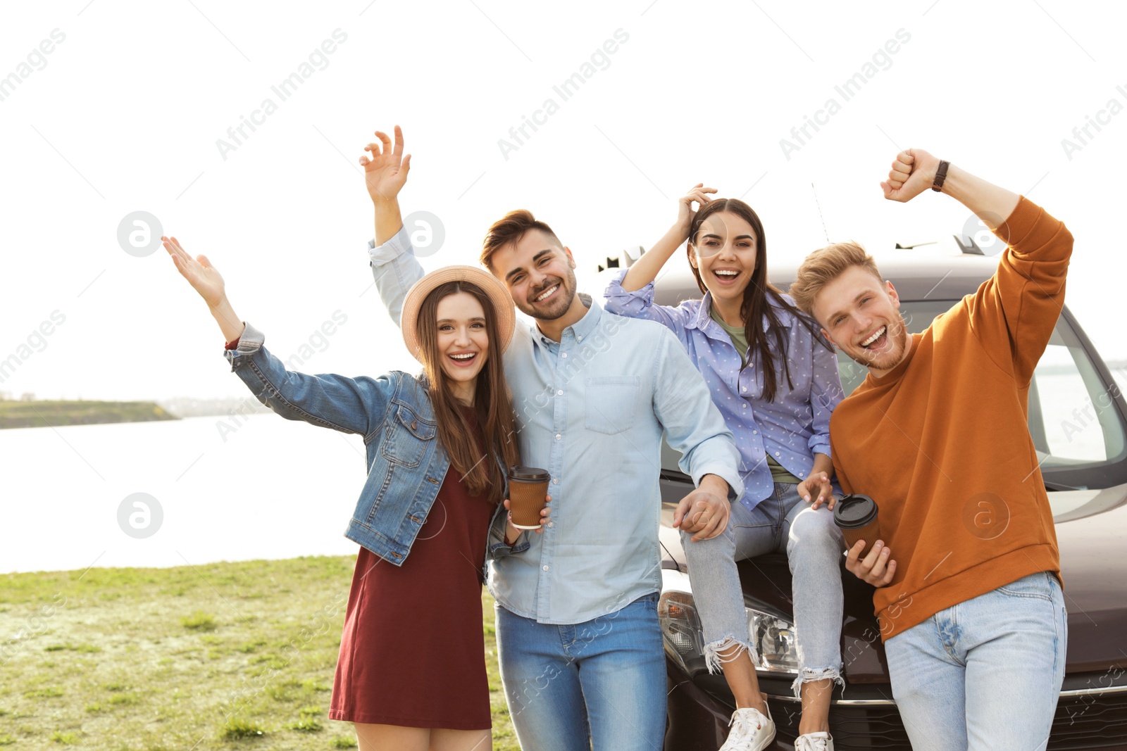 Photo of Group of happy people spending time together outdoors