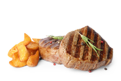 Delicious grilled beef medallions with fried potatoes isolated on white