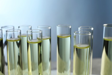 Photo of Test tubes with urine samples for analysis in laboratory, closeup