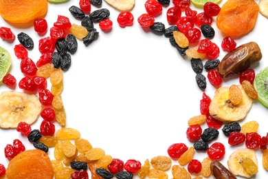 Photo of Frame made of different dried fruits on white  background, top view with space for text. Healthy lifestyle
