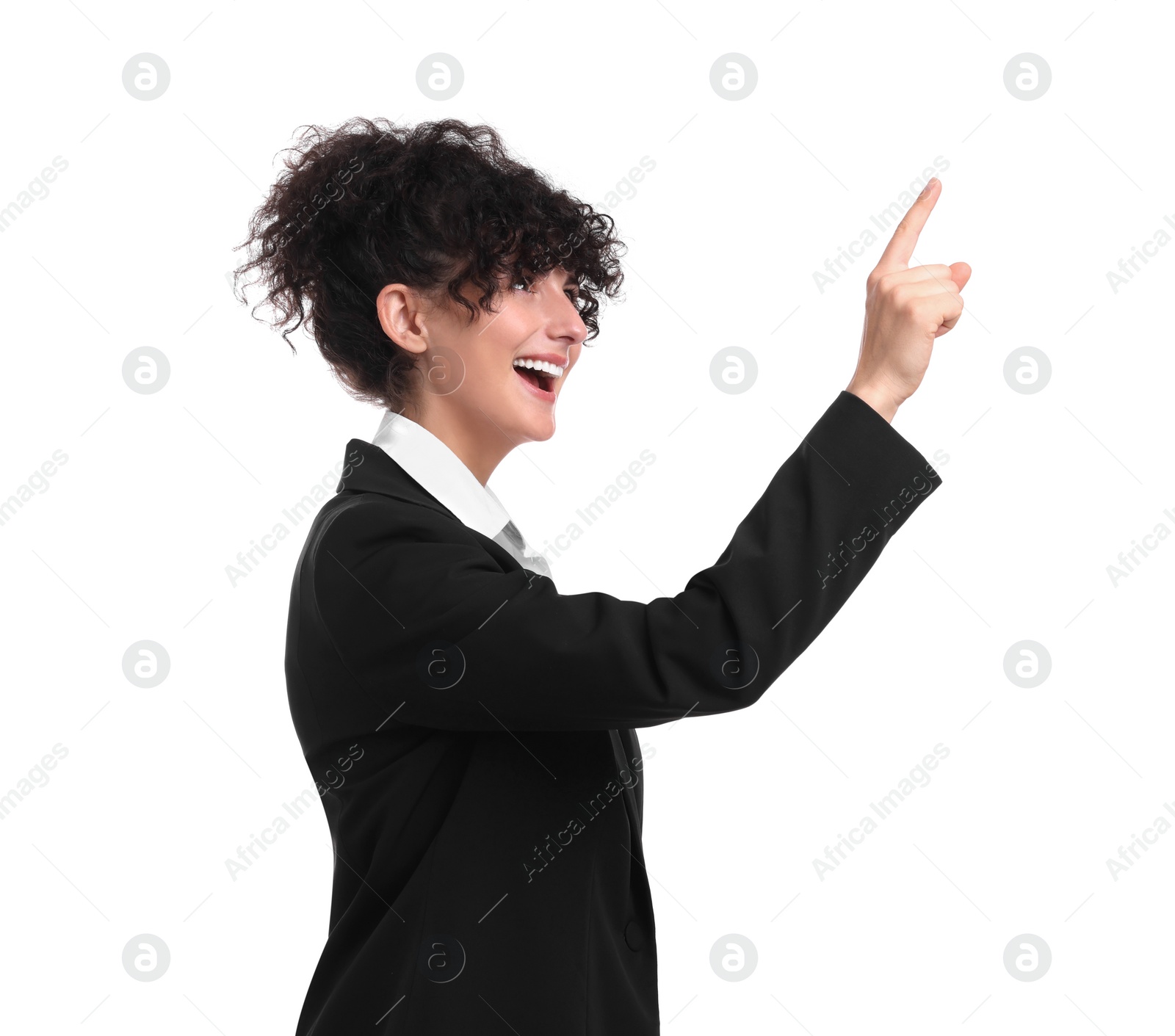 Photo of Beautiful happy businesswoman pointing at something on white background