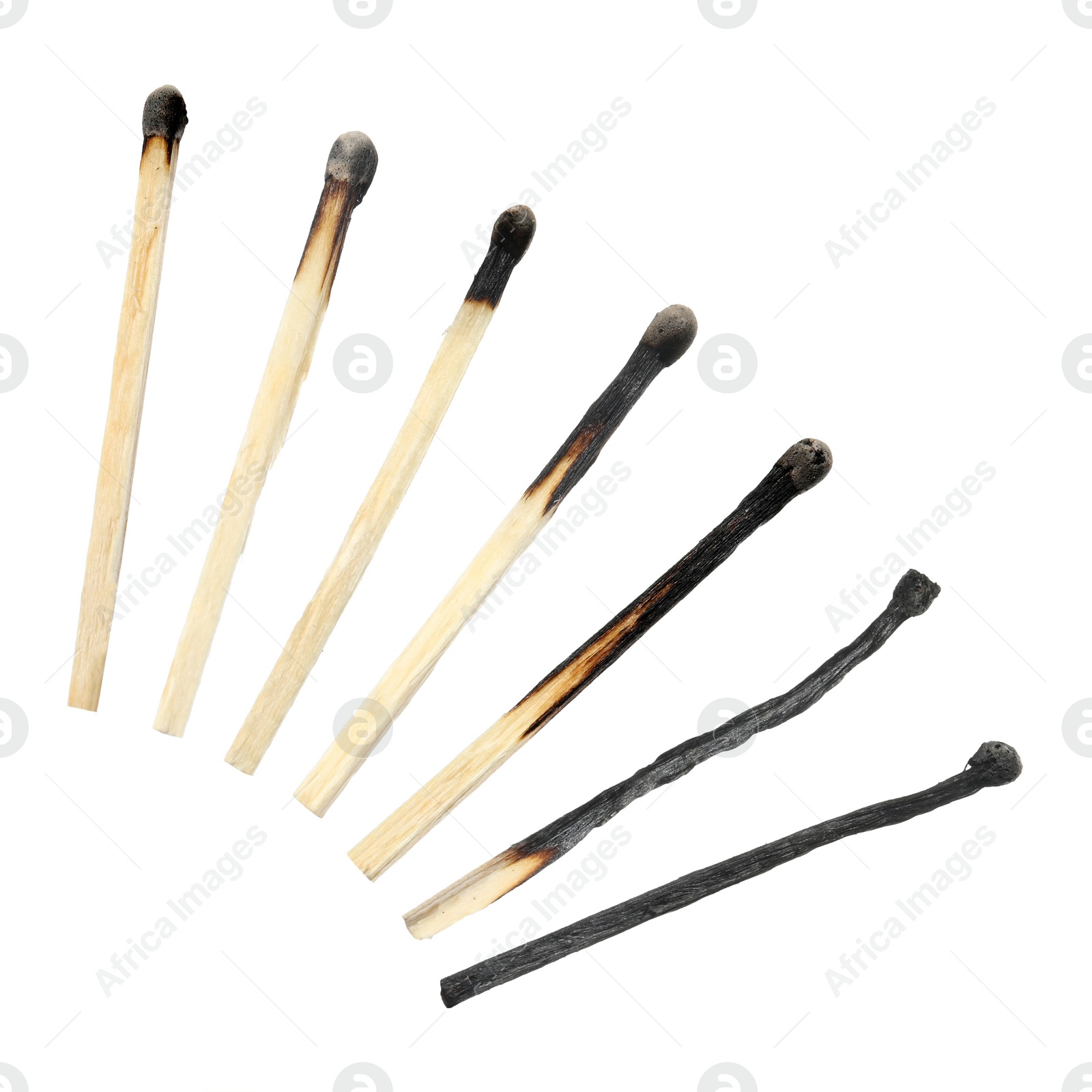 Image of Set with burnt matches on white background