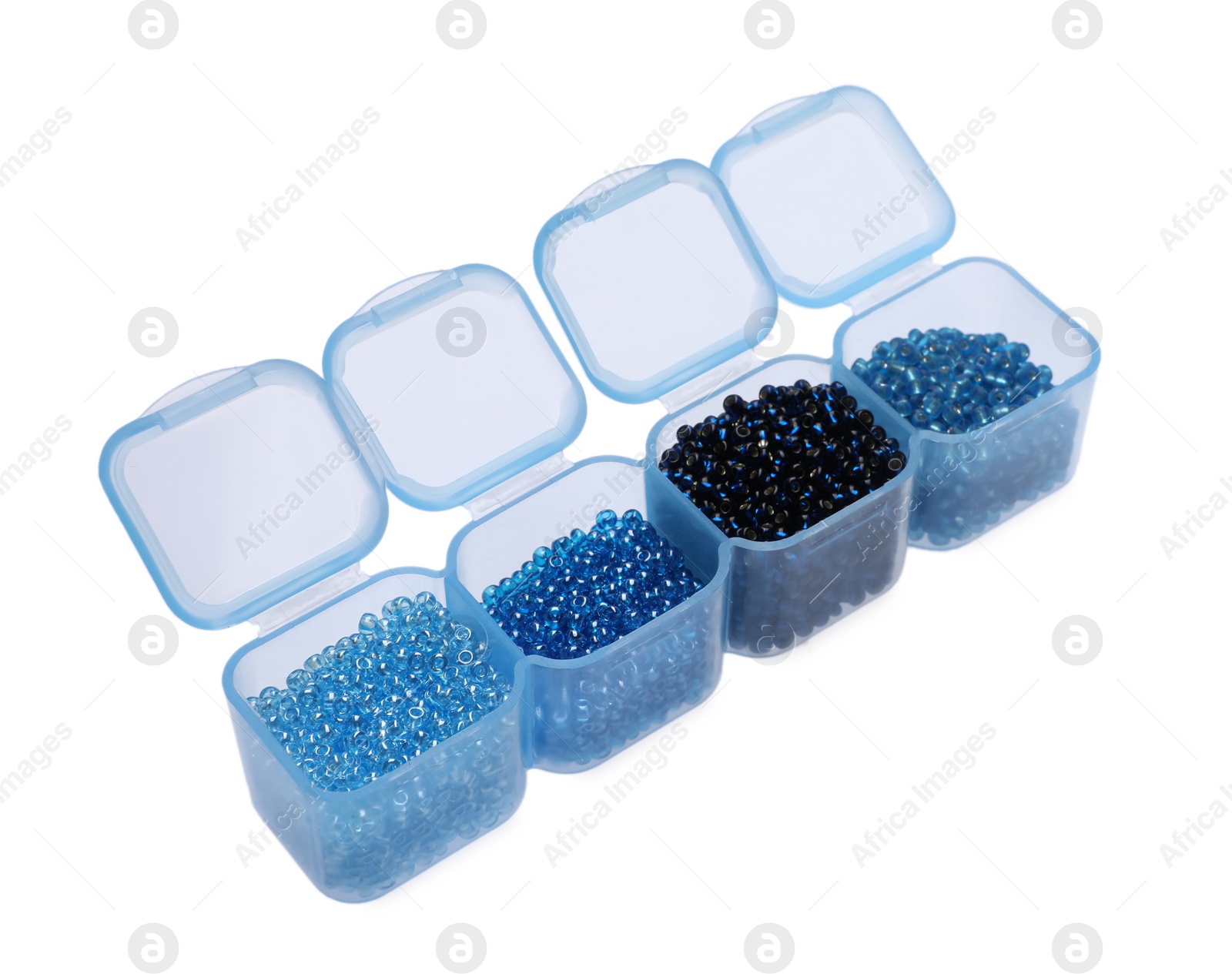 Photo of Plastic organizer with different beads on white background