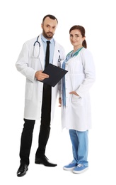 Full length portrait of doctors with clipboard isolated on white. Medical staff