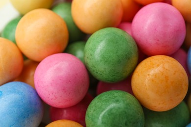 Photo of Many bright chewy gumballs as background, closeup