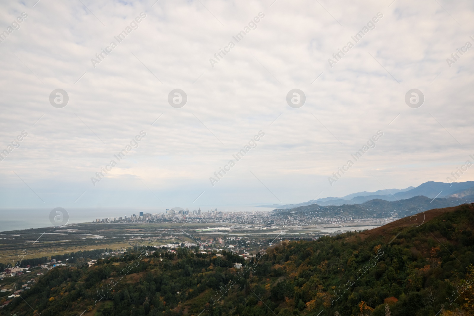 Photo of Picturesque view of beautiful valley, city and mountains