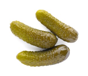 Tasty crunchy pickled cucumbers on white background, top view