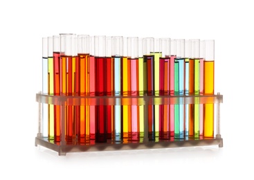 Photo of Rack with test tubes of color liquids isolated on white. Solution chemistry