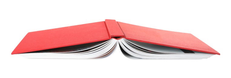 Photo of Open book with red cover on white background