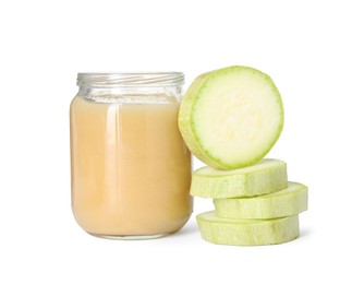 Tasty baby food in jar and fresh squash isolated on white