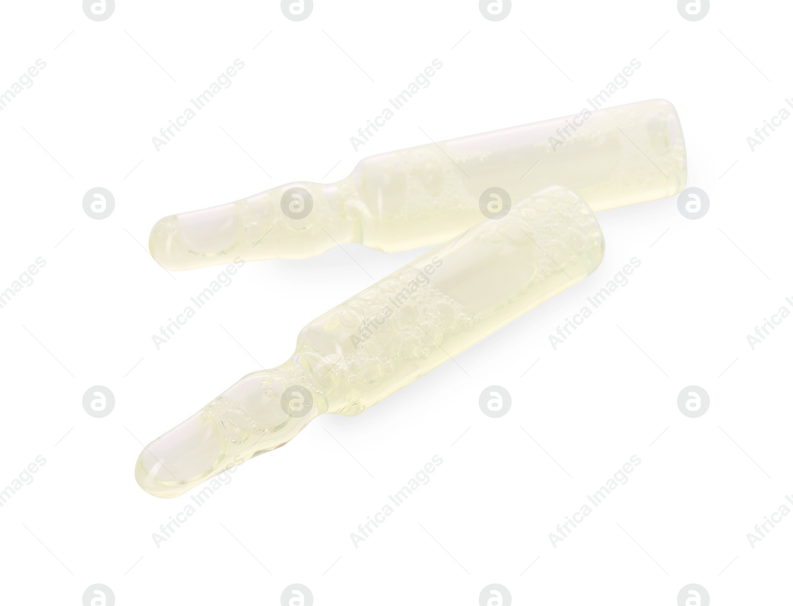 Photo of Glass ampoules with liquid isolated on white, above view