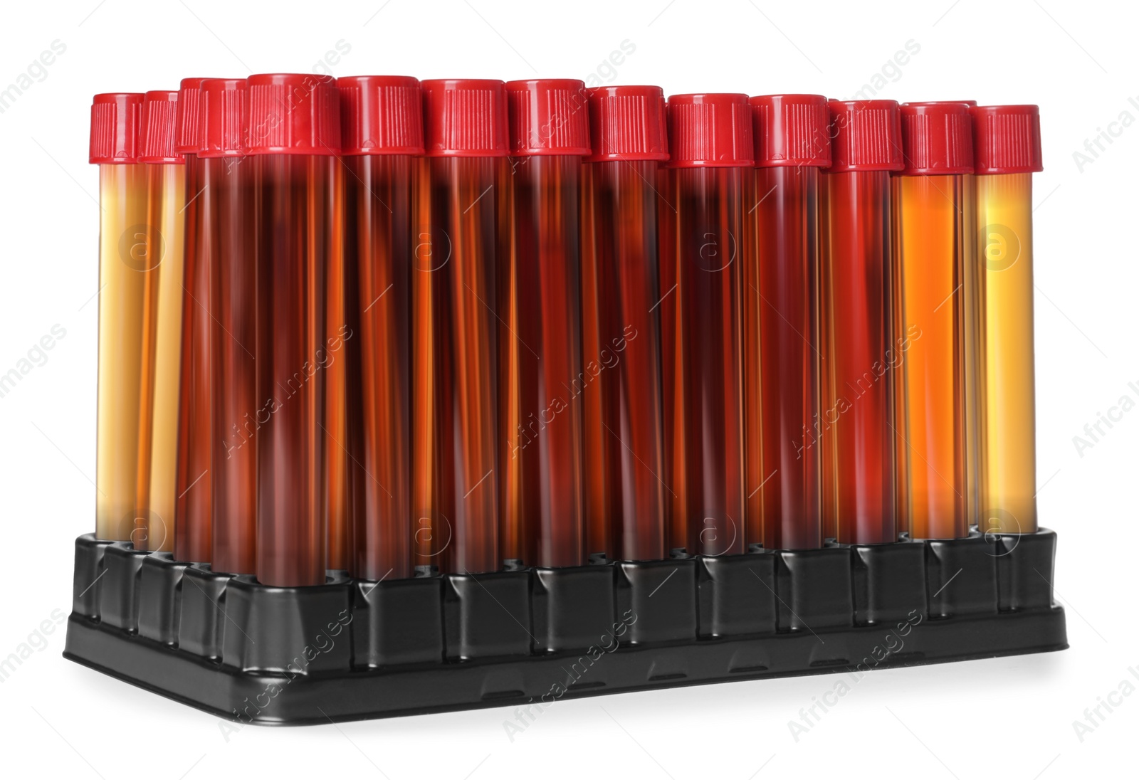 Photo of Test tubes with brown liquid in stand on white background