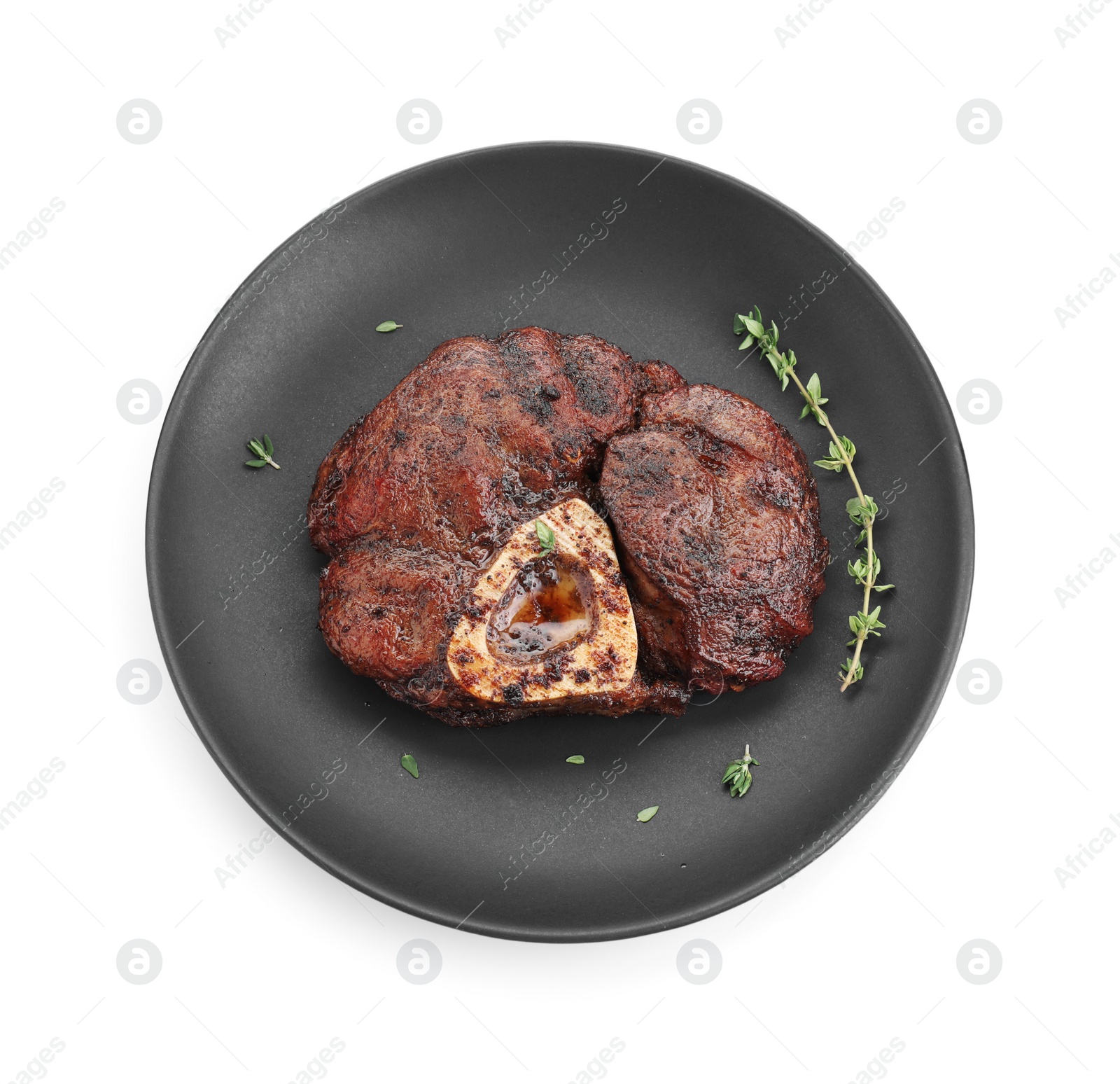 Photo of Delicious grilled beef meat with thyme isolated on white, top view