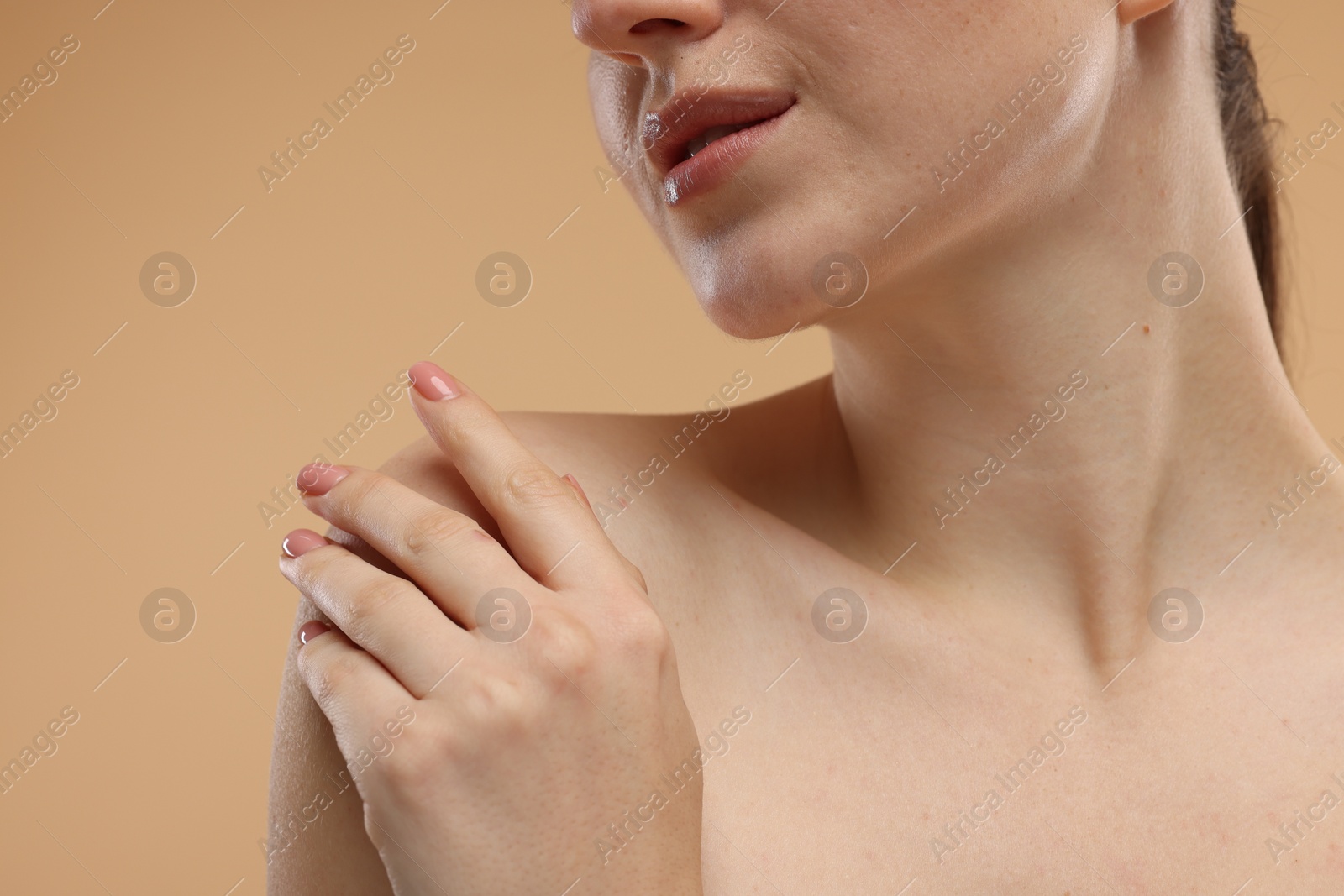 Photo of Woman on beige background, closeup. Space for text