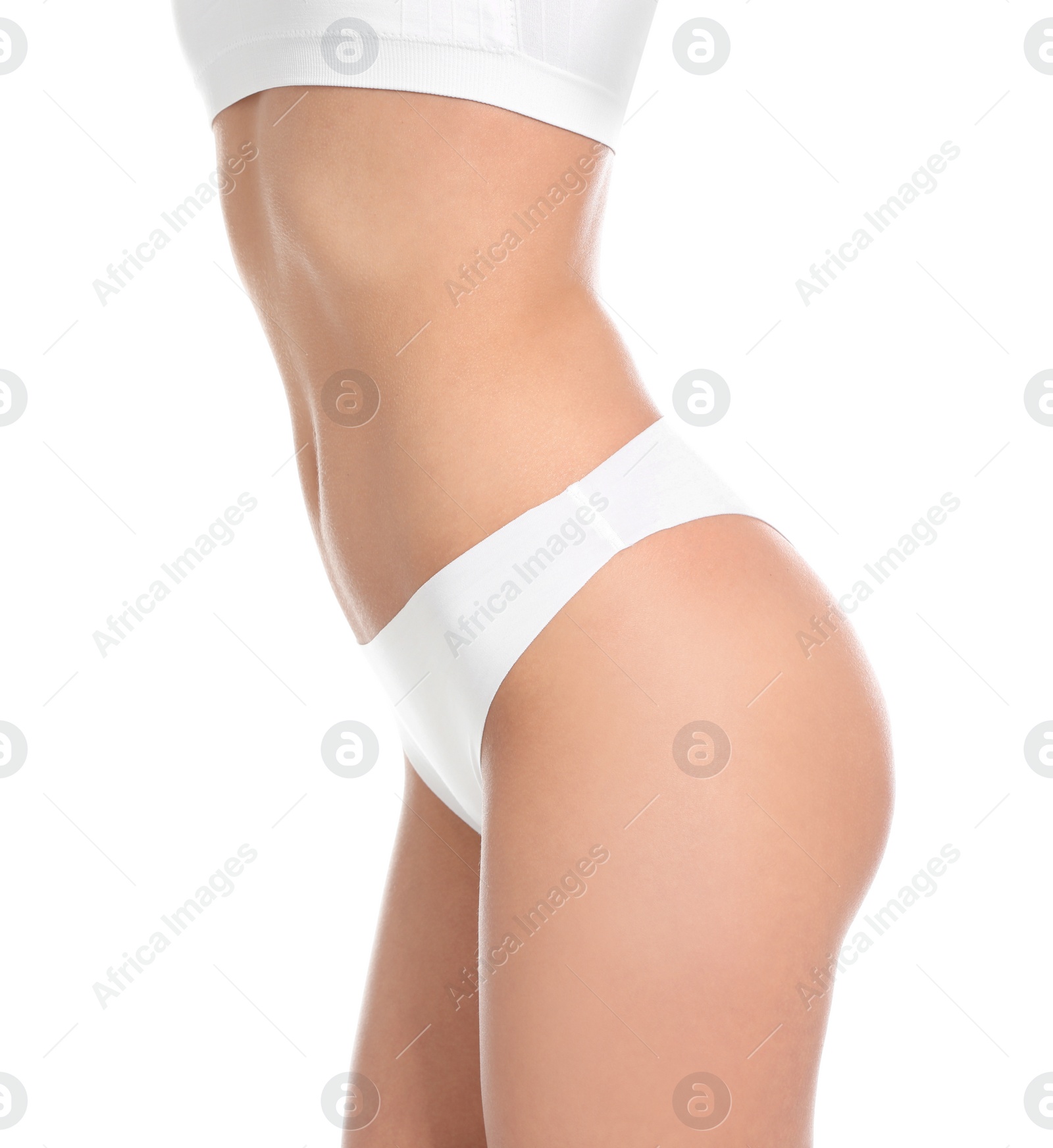 Photo of Slim young woman with smooth gentle skin on white background, closeup. Beauty and body care concept