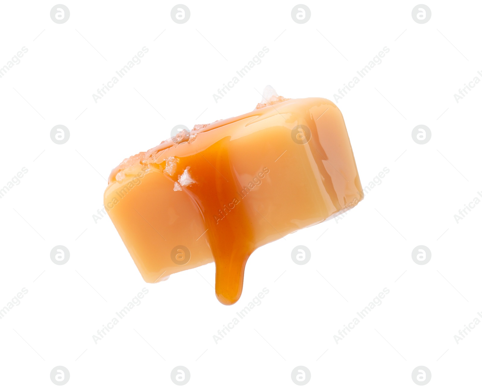 Photo of Yummy candy with salted caramel isolated on white