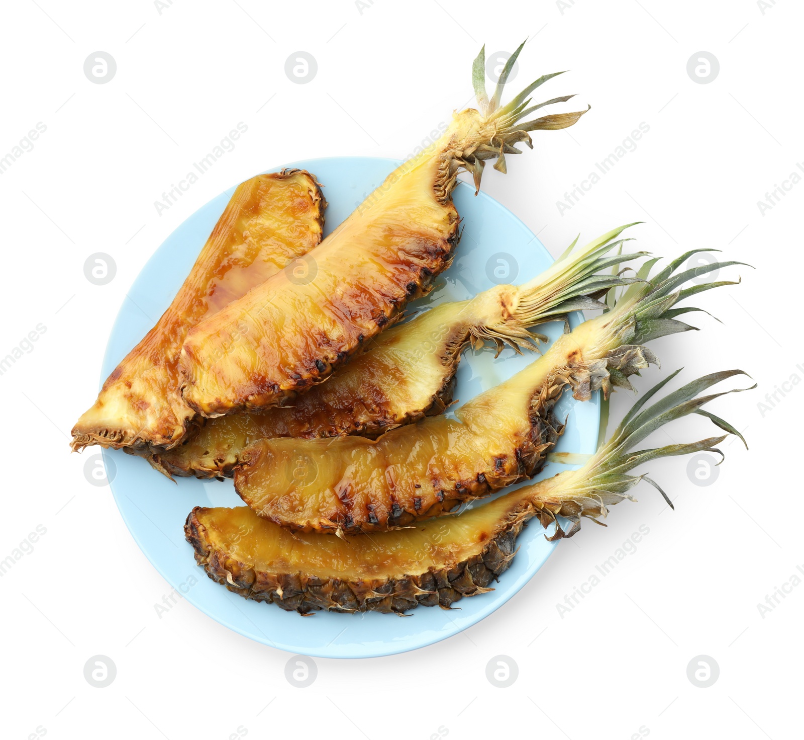 Photo of Tasty grilled pineapples isolated on white, top view