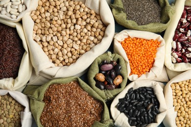 Photo of Different grains and seeds as background, top view. Veggie diet