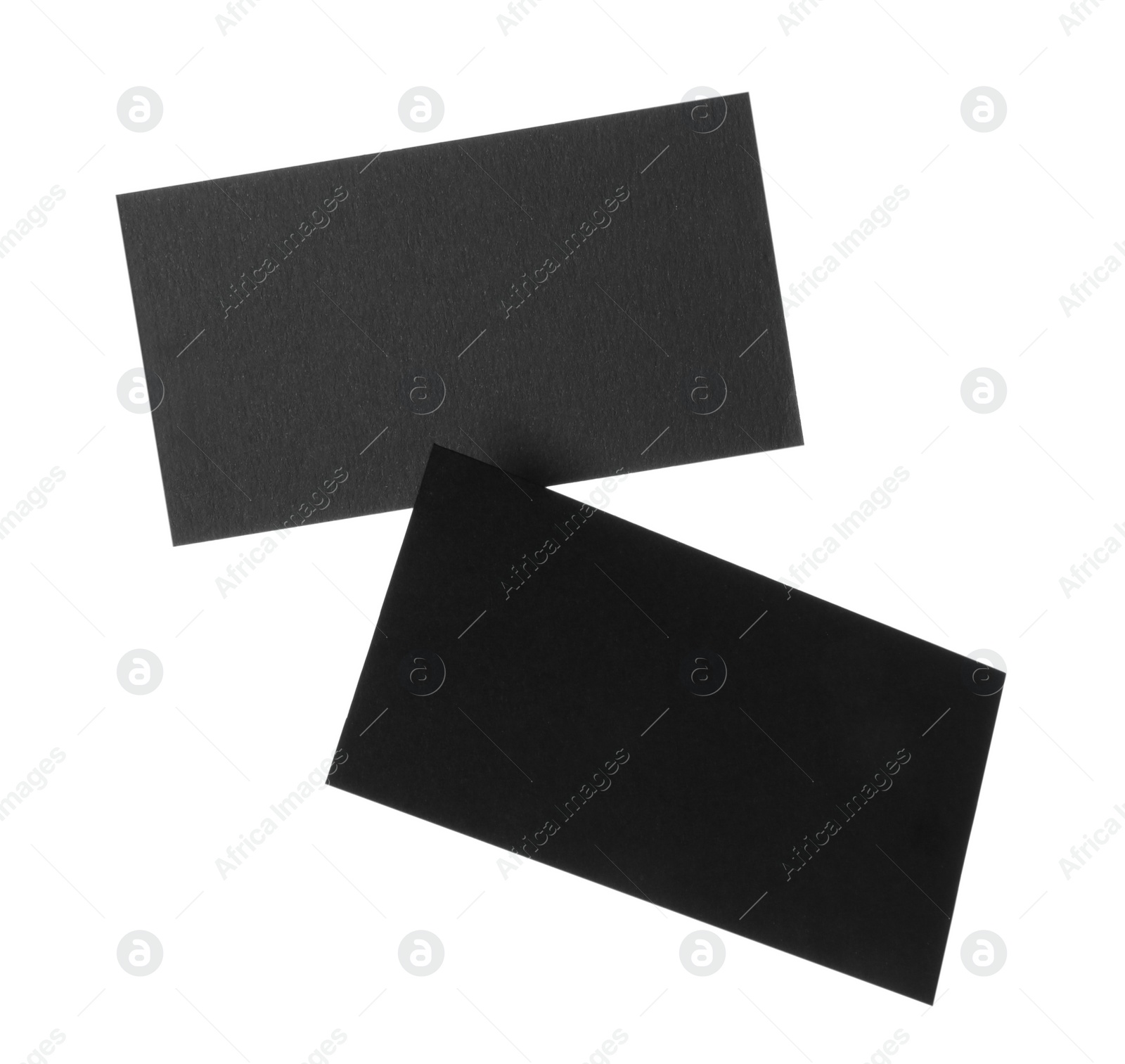 Photo of Blank black business cards isolated on white. Mockup for design