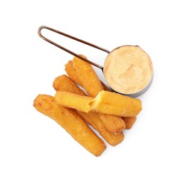 Photo of Tasty fried mozzarella sticks and sauce isolated on white, top view