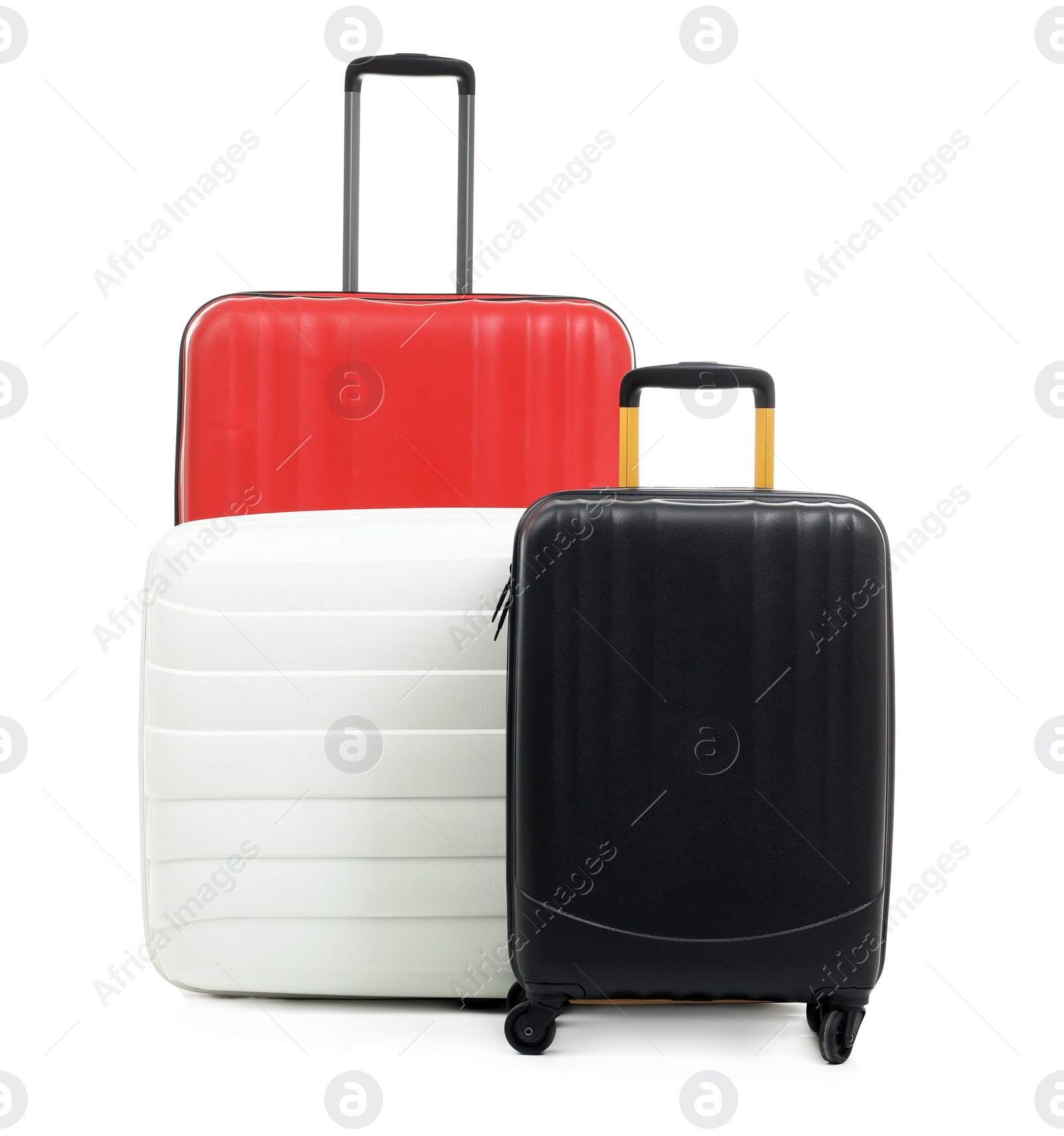 Photo of New suitcases packed for journey on white background