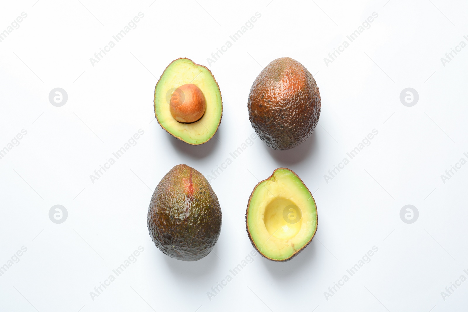 Photo of Composition with ripe fresh avocados on white background