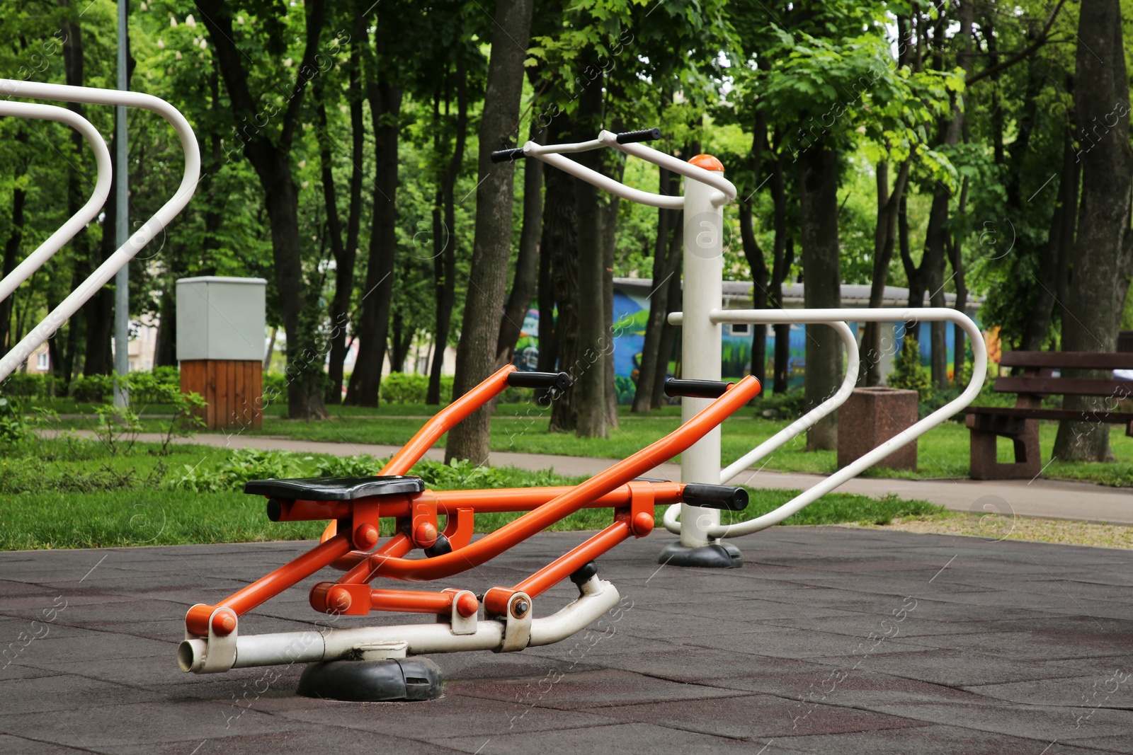 Photo of Empty outdoor gym with push up bars and rowing machine