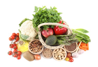 Healthy food. Basket with different fresh products isolated on white, top view