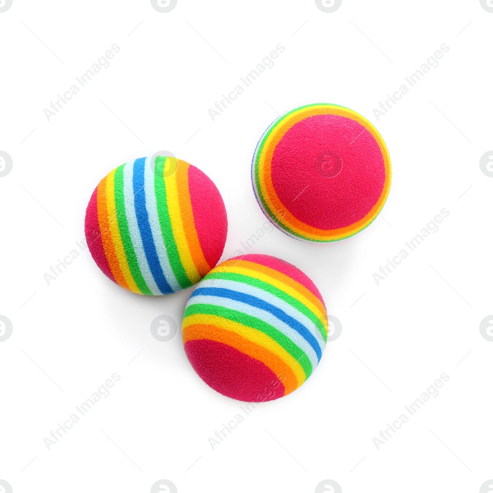 Photo of Colorful balls for cat on white background, top view. Pet toys