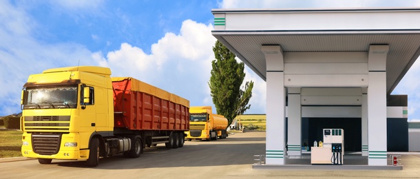Image of Bright trucks near modern gas filling station. Banner design