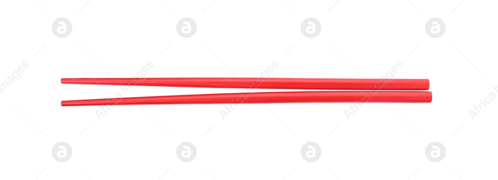 Photo of Pair of red chopsticks isolated on white, top view