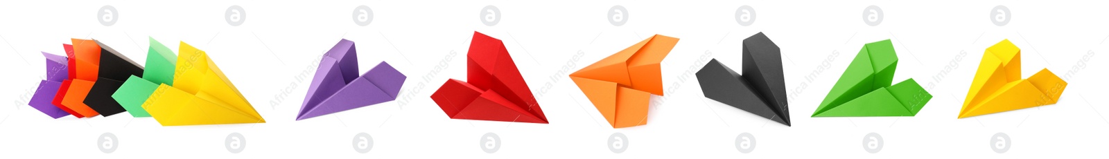 Image of Set with handmade different color paper planes on white background. Banner design