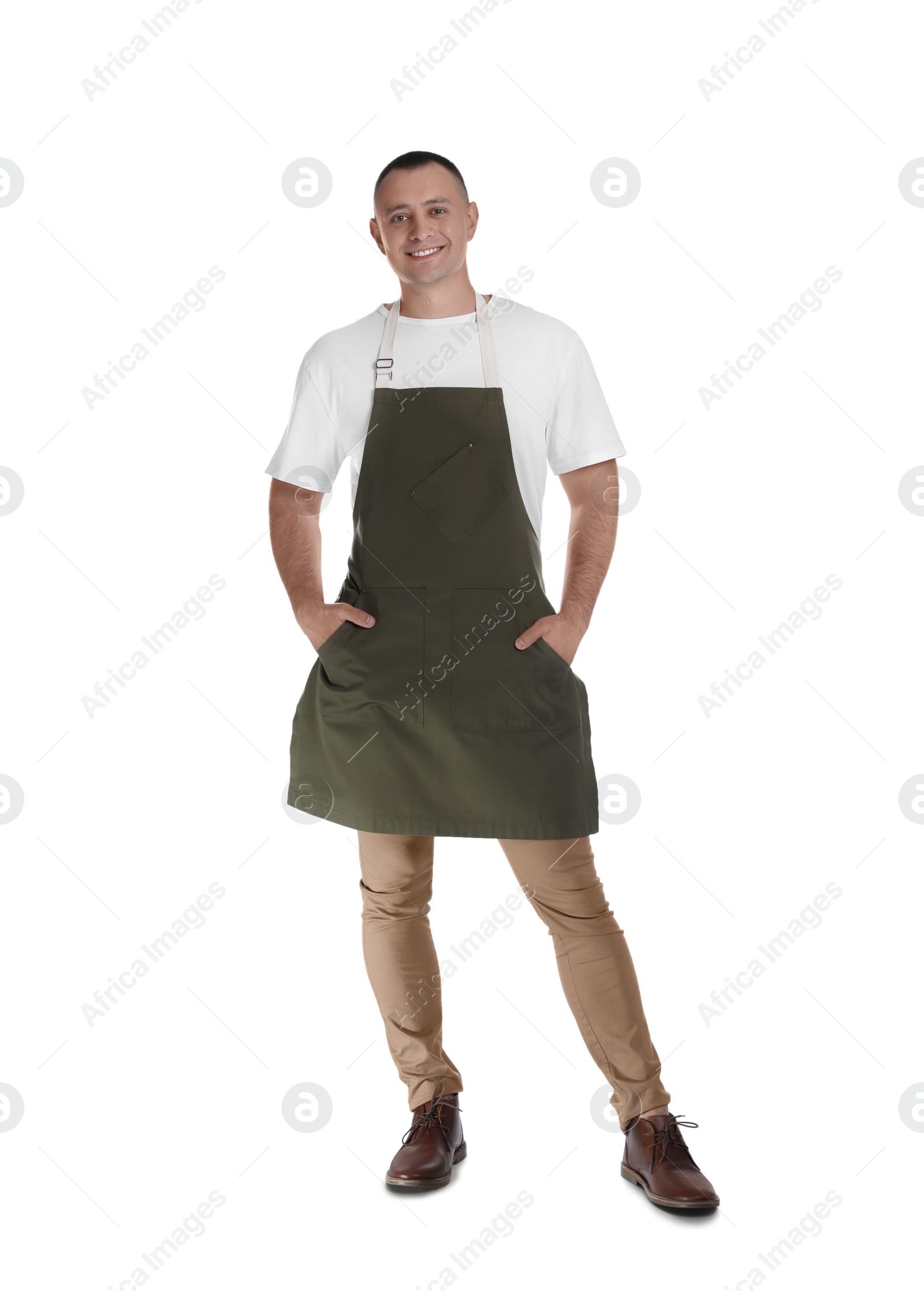 Photo of Full length portrait of happy young waiter in uniform on white background