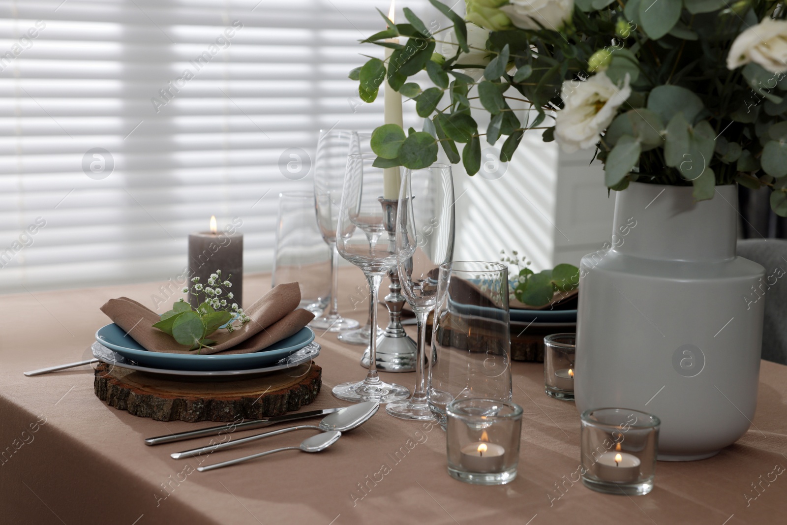 Photo of Festive table setting with beautiful tableware and decor indoors