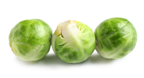 Fresh tasty Brussels sprouts on white background