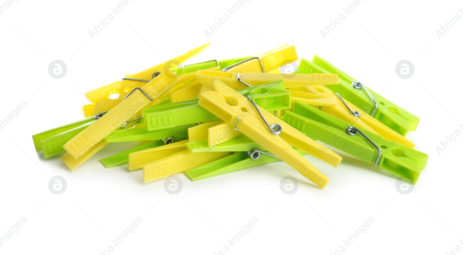 Photo of Many colorful plastic clothespins on white background