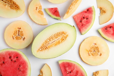 Photo of Flat lay composition with melon and watermelon on white background