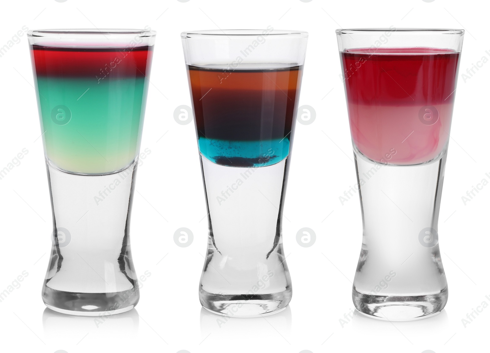 Image of Different shooters in shot glasses isolated on white, set