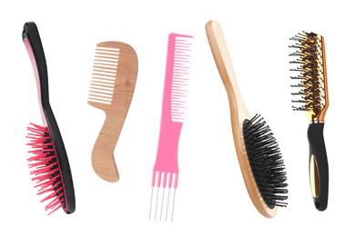 Image of Set with different hair brushes and combs on white background