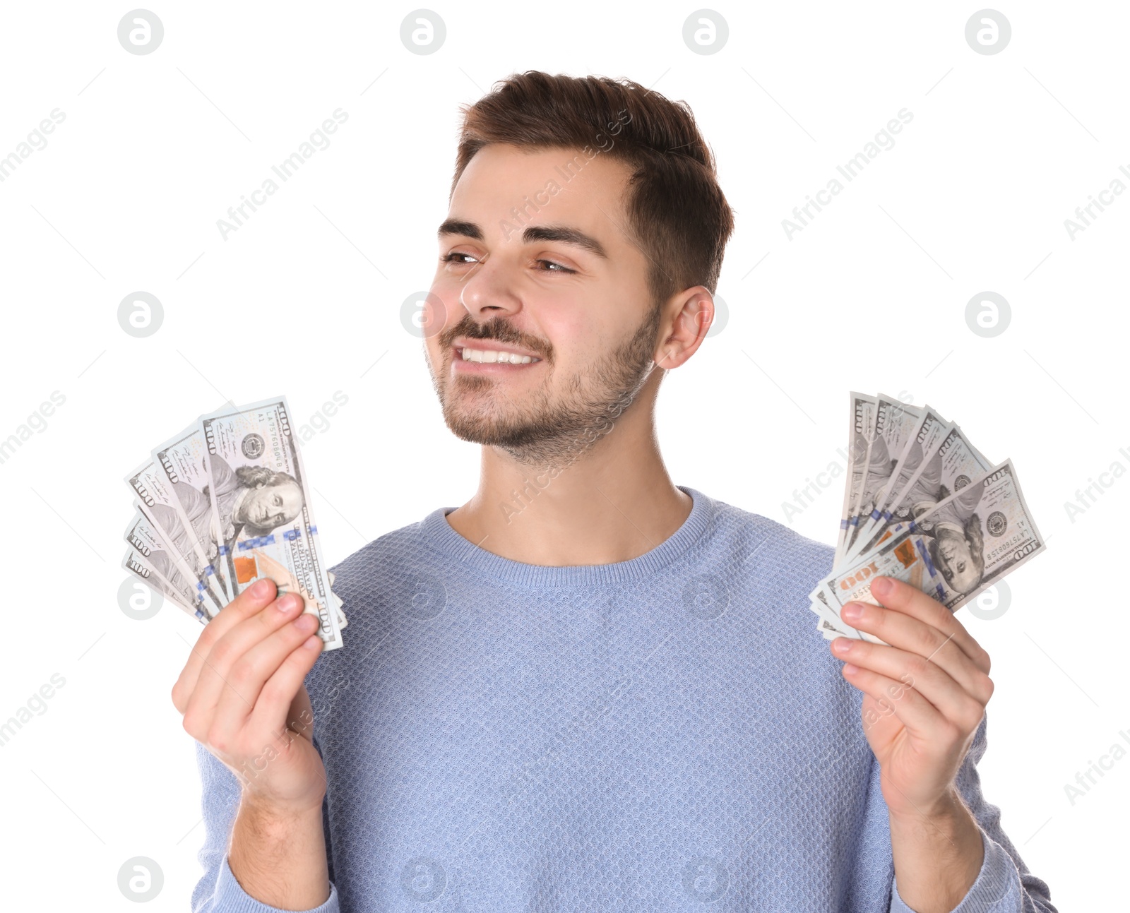 Photo of Portrait of happy young man with money on white background