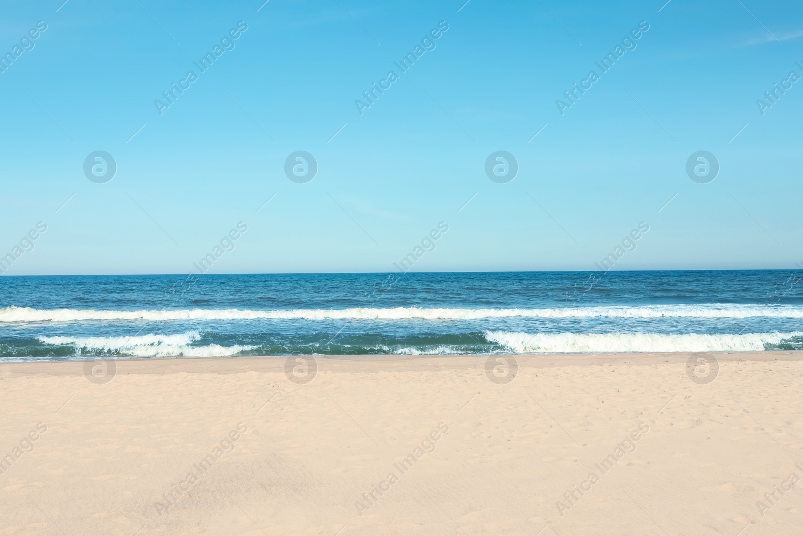 Photo of Picturesque view of beautiful sea and sandy beach on sunny day