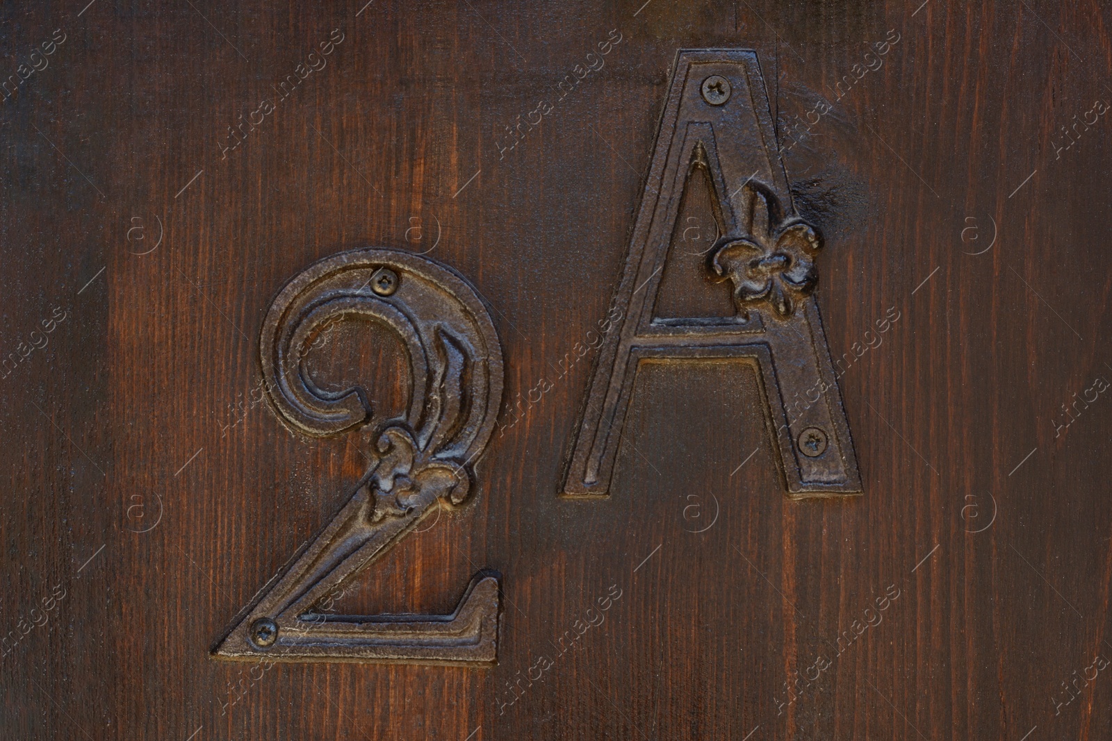 Photo of House number 2A on wooden door, closeup