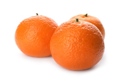 Photo of Fresh tangerines on white background. Citrus fruit