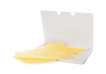 Package with facial oil blotting tissues on white background. Mattifying wipes