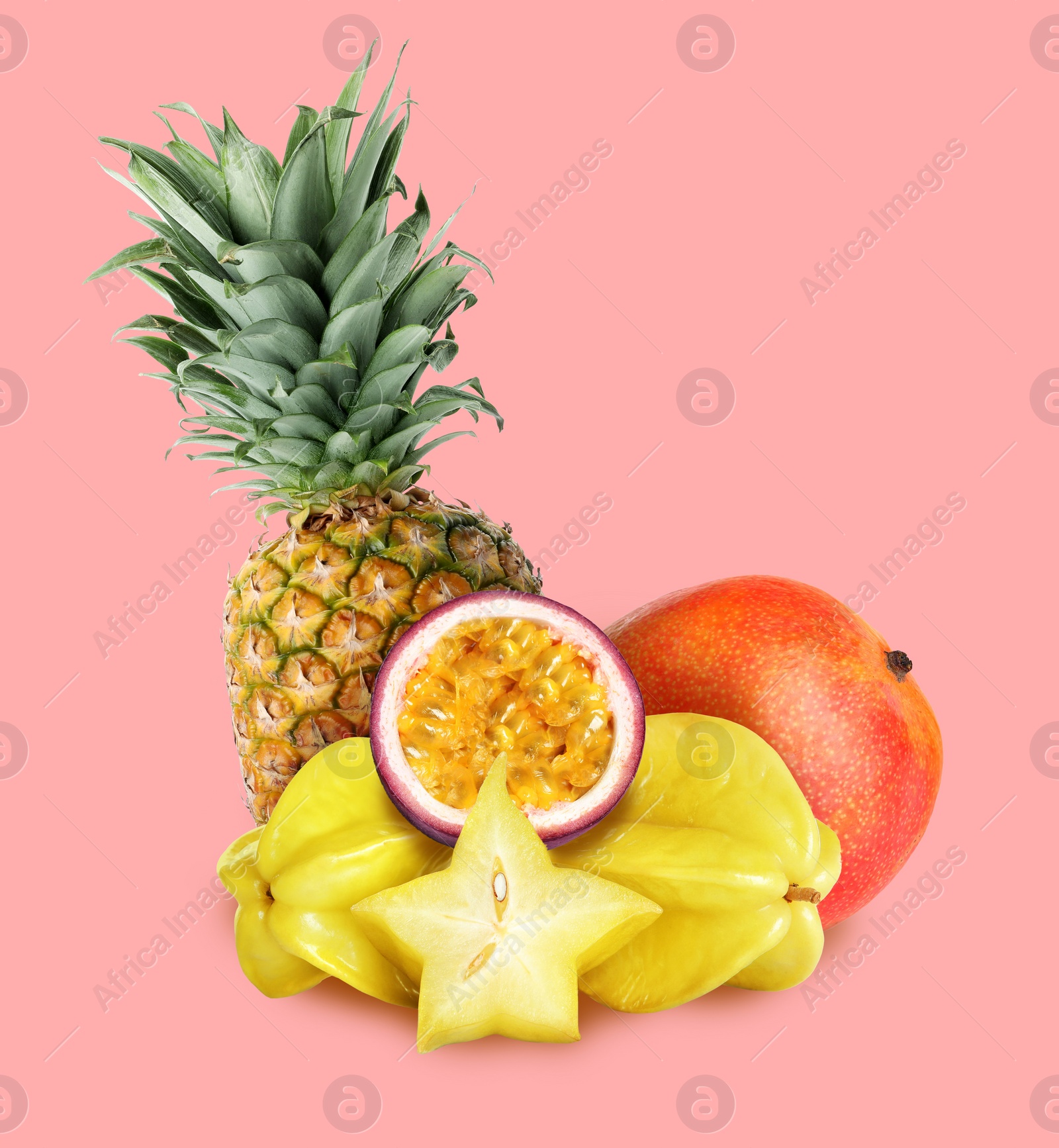 Image of Many different fresh fruits on light pink background